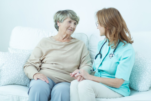 Talking with old patient - Photo, Image