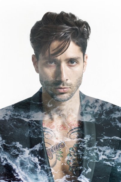 Double exposure of handsome man and sea foam - Photo, Image