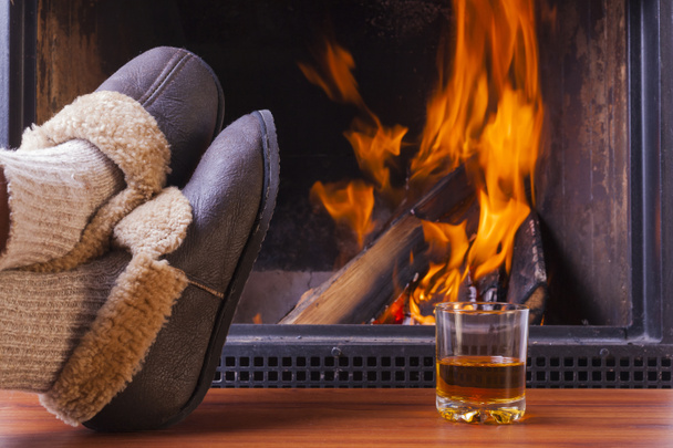 relaxing at fireplace in winter or fall - Photo, Image