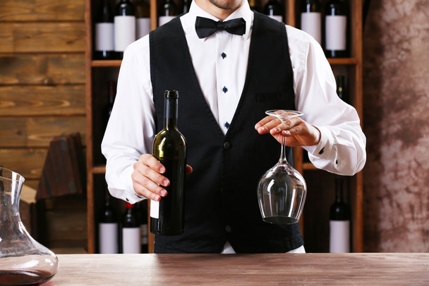 Bartender working at counter - Photo, image