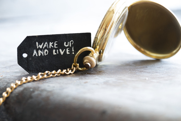 wake up and live and pocket watch - Valokuva, kuva