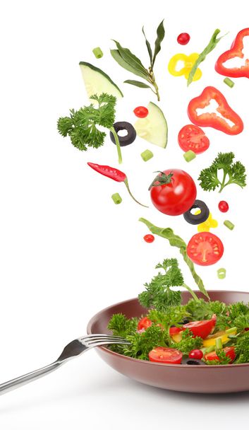 Salada fresca e legumes em queda
 - Foto, Imagem