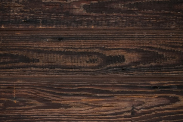 Textur aus altem Holz mit dunkelbrauner Farbe - Foto, Bild