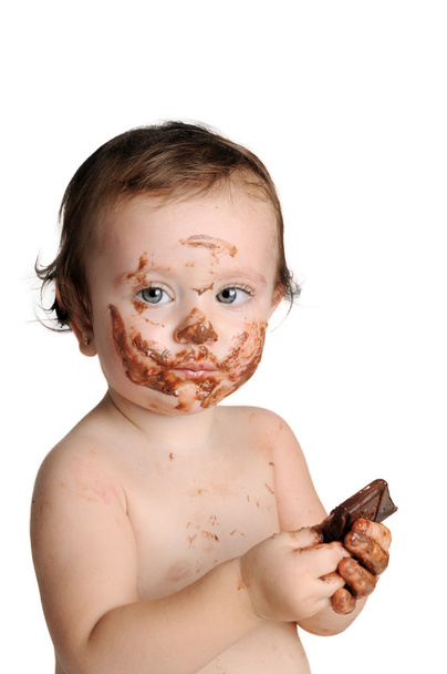 赤ちゃん、瞬間を楽しんで食べるチョコレート - 写真・画像