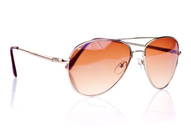 Moderb brown tinted aviator sunglasses on a white background - Zdjęcie, obraz