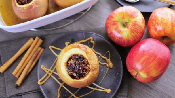 Baked apples with pecans and raisins - Footage, Video