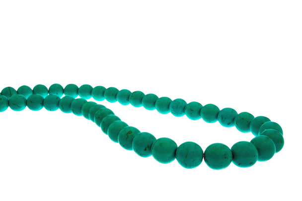Las perlas son de color turquesa
 - Foto, Imagen