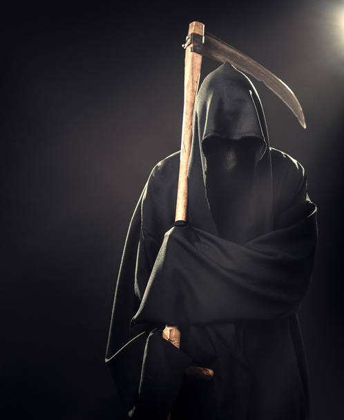 death with scythe standing in fog at night - 写真・画像