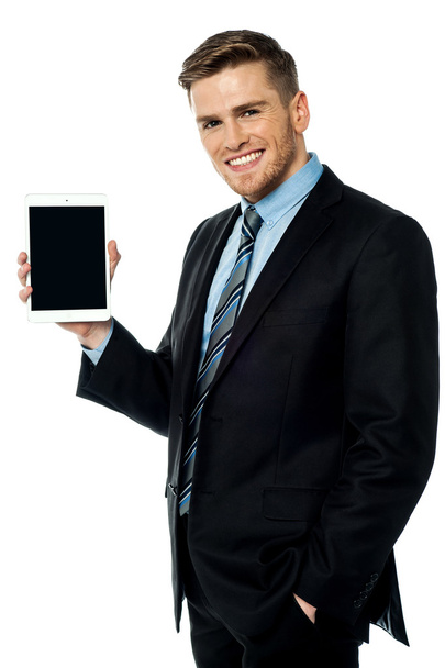 businessman presenting new tablet device - Zdjęcie, obraz