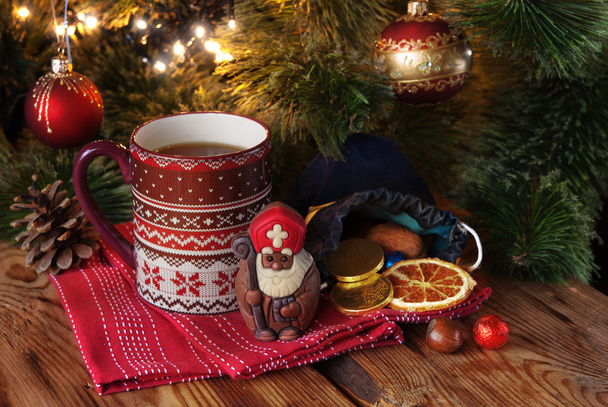 Saint Nicholas and cup of tea - Photo, Image