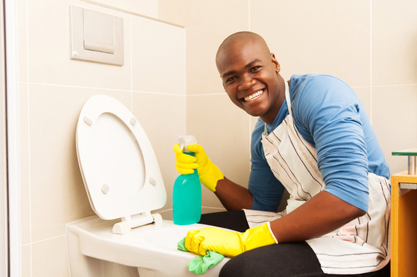 man cleaning toilet - Foto, imagen