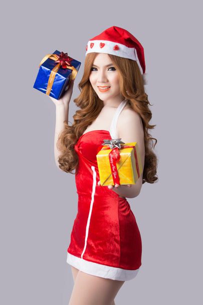 Beautiful woman in Santa Claus clothes - Photo, Image