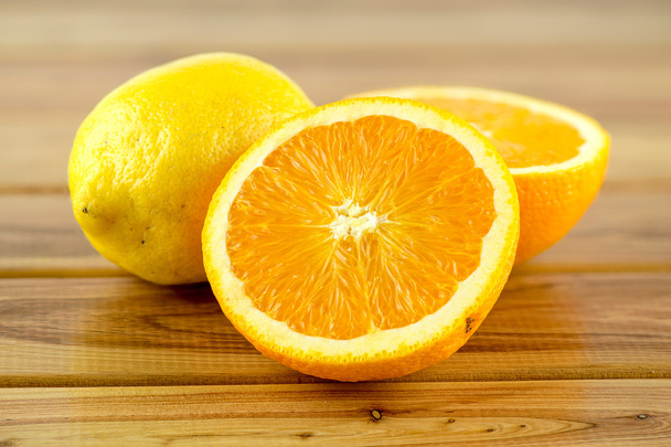 Szeletelt narancs, élénk sárga citrom - Fotó, kép