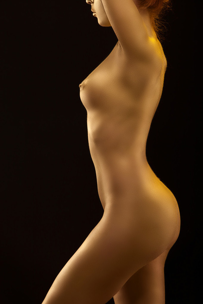 Beautiful Magic Woman Golden body painted Model Girl with gold skin - Fotoğraf, Görsel