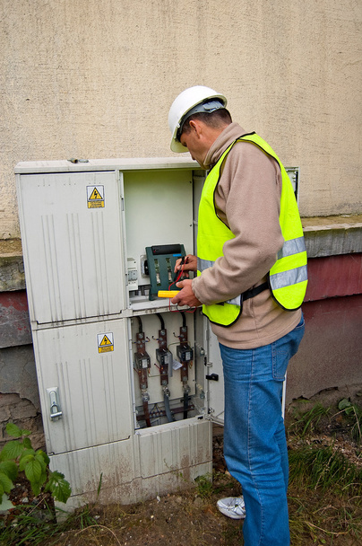 Electrician in switching power - Photo, Image