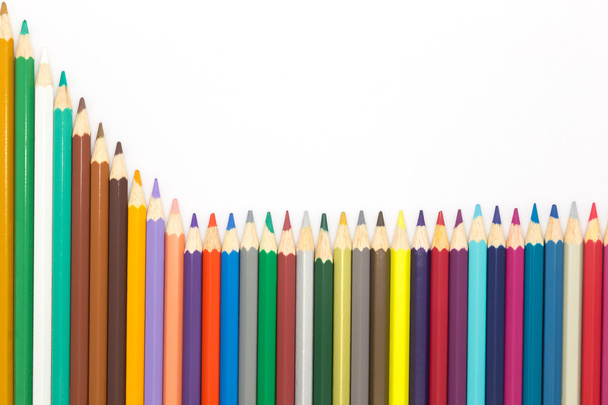 Close up multiple colour wooden pencil on white background - Foto, Imagem