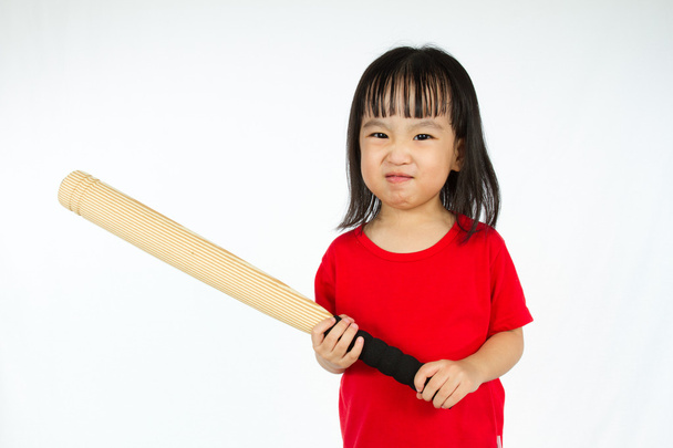 Chinese little girl holding baseball bat with angry expression - Fotoğraf, Görsel
