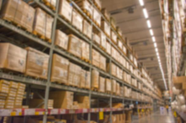 Raflar içinde büyük modern warehous satırlarının soyut bulanık kutuları - Fotoğraf, Görsel