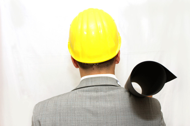 Retrato de trabalhador no capacete segurando um plano
 - Foto, Imagem