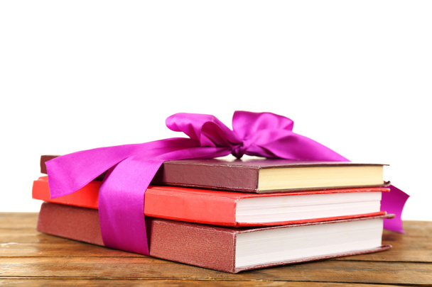 Stack of books with ribbon - Foto, Bild