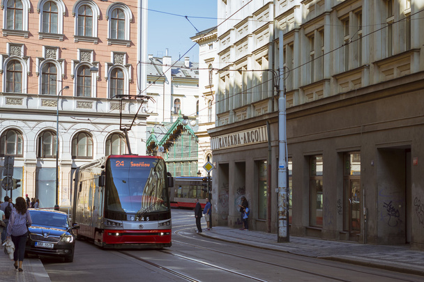 High-tech trams Skoda on a wide street in the district Nove Mesto Prague's - 写真・画像