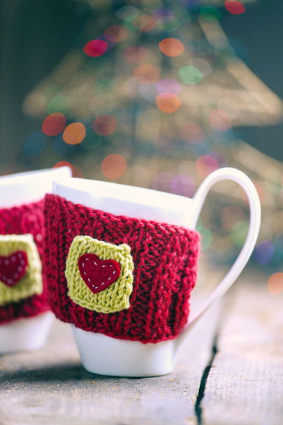 Knitted woolen cups - Fotoğraf, Görsel