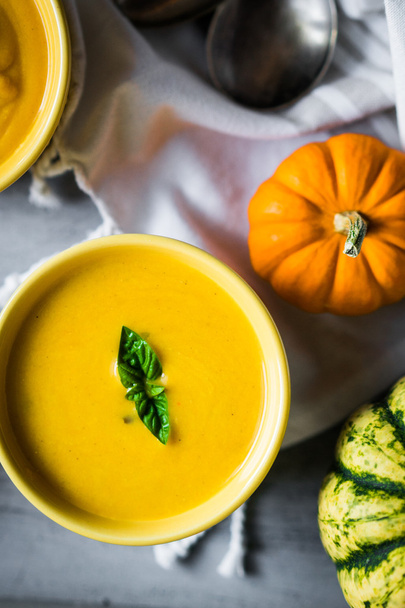 Pumpkin soup on rustic background - Photo, image