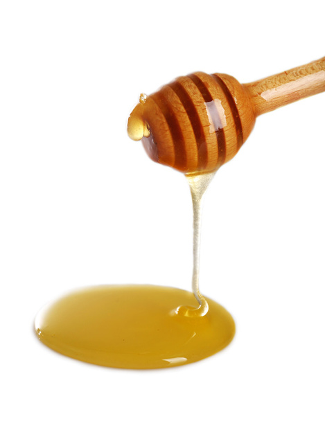 Honey dripping from dipper - Fotoğraf, Görsel