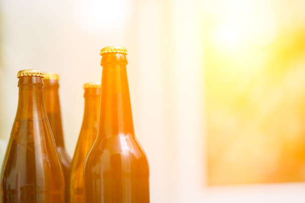 Close up of beer bottles - Foto, afbeelding