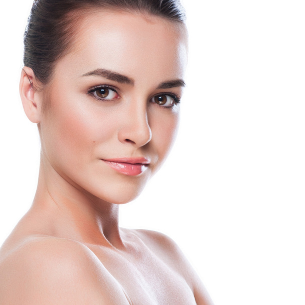 Beautiful face of young adult woman with clean fresh skin - Foto, imagen