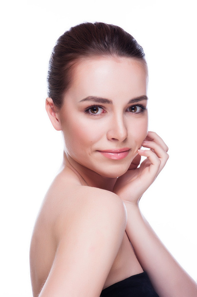 Beautiful face of young adult woman with clean fresh skin - Photo, Image