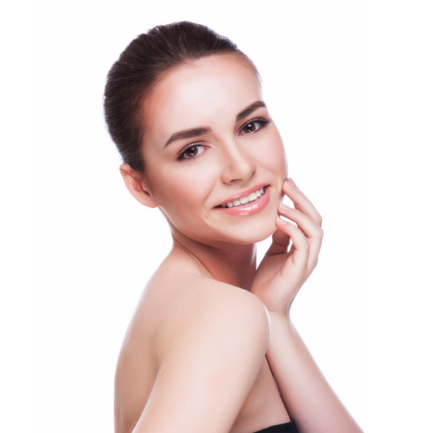 Beautiful face of young adult woman with clean fresh skin - Фото, зображення