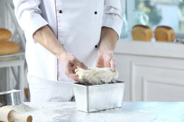 Making dough by male hands - Zdjęcie, obraz