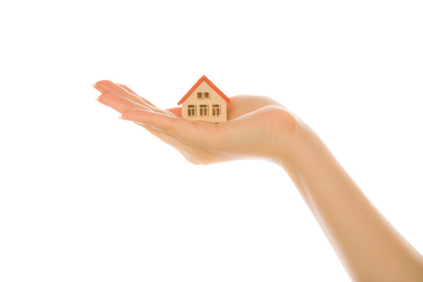 Woman hand with a little house - Фото, зображення