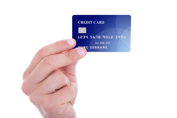 白で隔離のクレジット カードを持っている男性の手 - 写真・画像