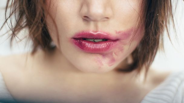 Sexual   lips with the smeared lipstick - Valokuva, kuva