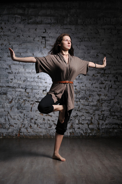 Woman doing yoga excercise - Fotó, kép