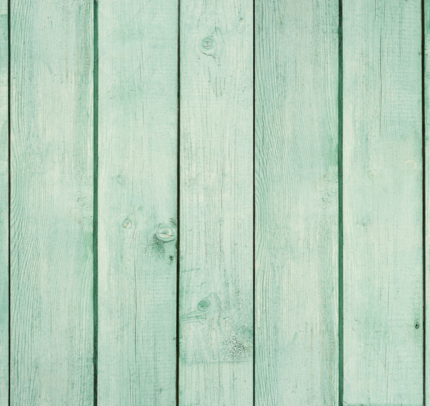 Old wooden board painted light green. - Фото, изображение