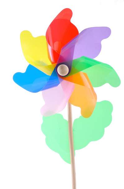 kleurrijke plastic speelgoed windmolen geïsoleerd op witte achtergrond - Foto, afbeelding