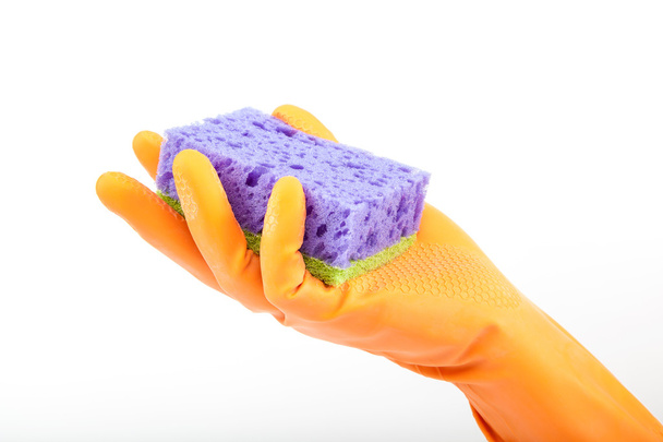 Sponge in hand with a rubber glove on white background. - Foto, Imagem