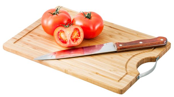 tomatoes on a cutting board - Foto, afbeelding