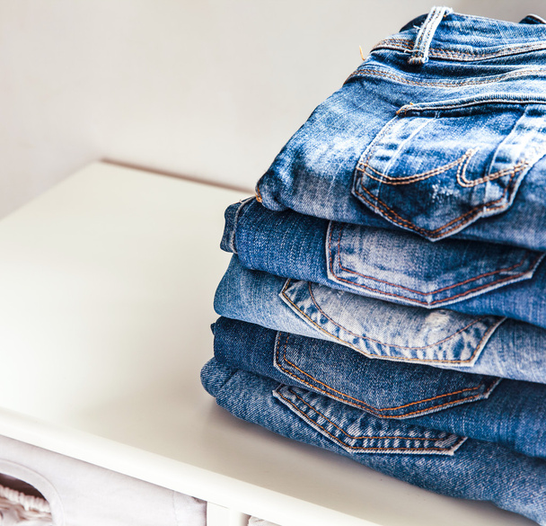 Lot of different blue jeans Blue Jeans. clothes - Foto, Bild