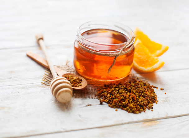 Fresh honey on wooden table - Foto, Imagem