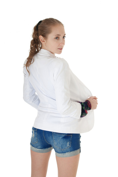 Rear view of woman dressed in  blue jeans shorts - Photo, Image