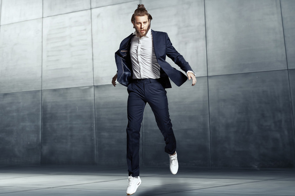 Attractive young man wearing sports suit - 写真・画像