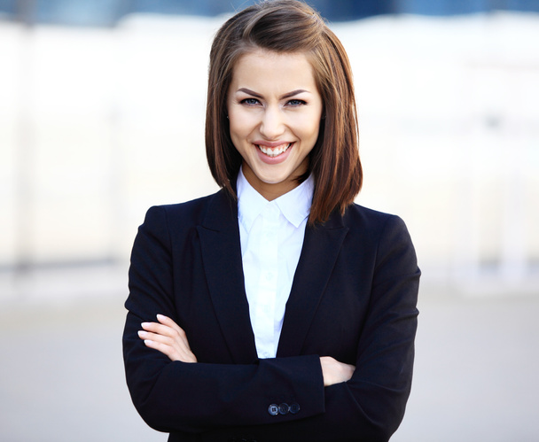 επιτυχημένη γυναίκα των επιχειρήσεων χαμογελώντας - Φωτογραφία, εικόνα