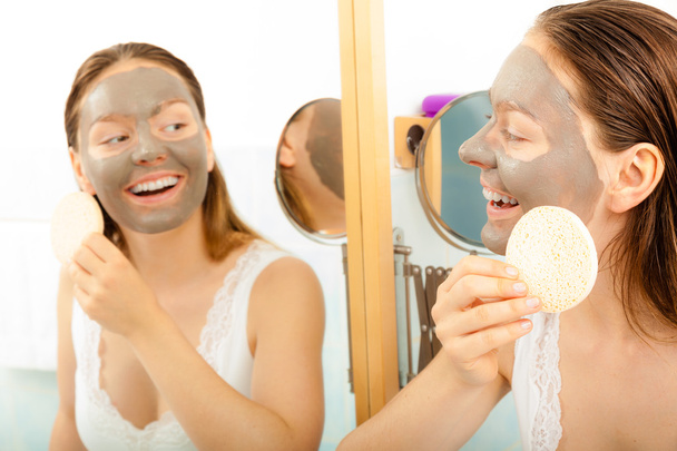 woman with facial clay mask - Фото, изображение