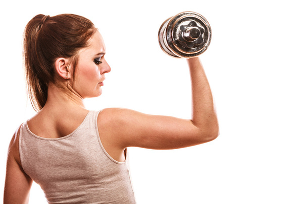 woman exercising with dumbbell - Photo, Image