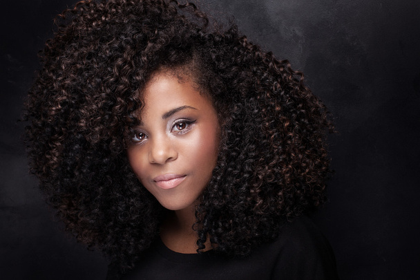 Beauty portrait of young girl with afro. - Foto, imagen
