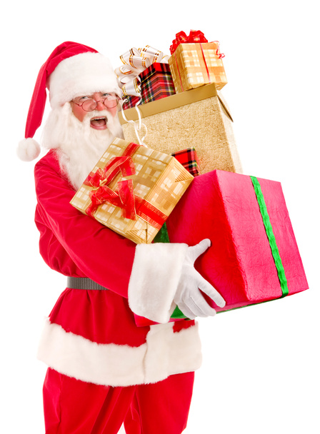 Санта Клаус принес много рождественских подарков
 - Фото, изображение